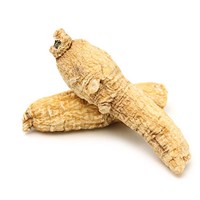 Two dried American ginseng roots arranged at an angle, an herb and adaptogen known to support healthy mood.