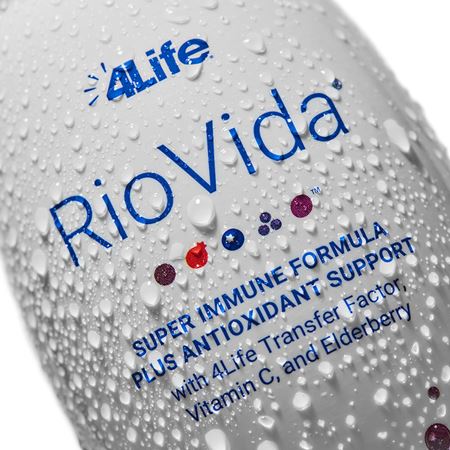 Close-up of a RioVida bottle with text highlighting its Super Immune Formula, 4Life Transfer Factor, Vitamin C, and Elderberry